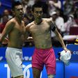 Lin Dan (left) embraces badminton rival Lee Chong Wei after their match at the Malaysia in April 2017