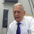 US Defense Secretary James Mattis speaks to reporters on board a flight to Jordan for the start of a regional tour on August 20, 2017