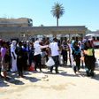 African migrants gather at a centre in the Libyan capital on August 17, 2017 ahead of being repatriated to their country of origin under a voluntary programme coordinated by the International Organization for Migration (IOM)