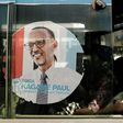 A bus is adorned with an image of incumbent Rwandan President Paul Kagame, expected to win a third election term in Friday's poll