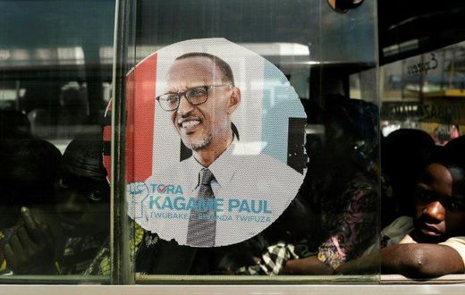 A bus is adorned with an image of incumbent Rwandan President Paul Kagame, expected to win a third election term in Friday's poll