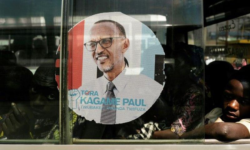 A bus is adorned with an image of incumbent Rwandan President Paul Kagame, expected to win a third election term in Friday's poll