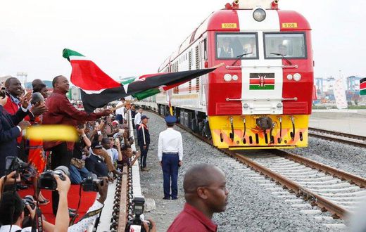 President Uhuru Kenyatta flags off the first cargo train on the Standard Gauge Railway in Mombasa, May 30, 2017.