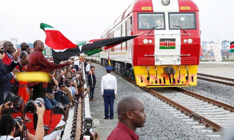 President Uhuru Kenyatta flags off the first cargo train on the Standard Gauge Railway in Mombasa, May 30, 2017.