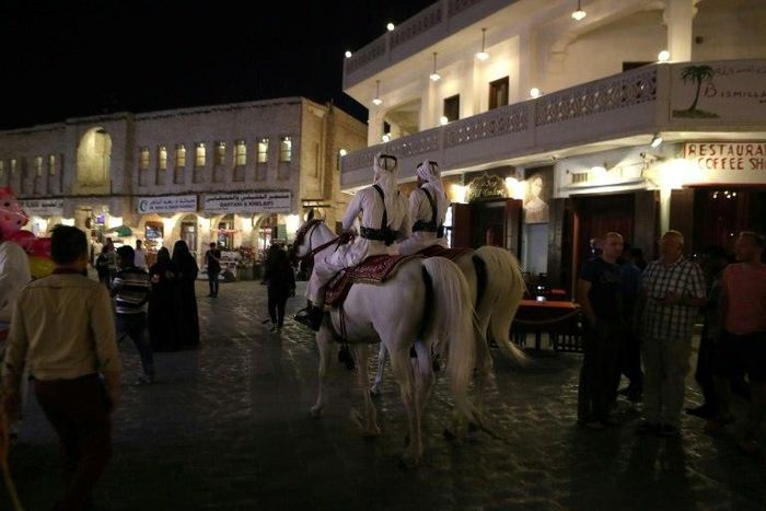 Mounted police patrol the popular Souq Waqif market, in the Qatari capital, Doha