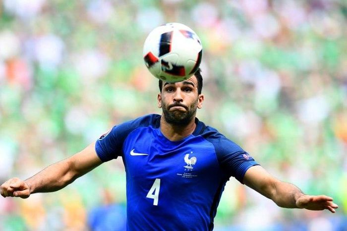 France's defender Adil Rami plays the ball during the Euro 2016 round of 16 football match against Republic of Ireland at the Parc Olympique Lyonnais stadium June 26, 2016