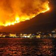 Smoke and flames rise from a blaze above Podstrana, near the Croatian Adriatic coastal town of Split, on July 18, 2017