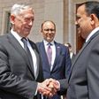 A handout picture from the Iraqi Ministry of Defence shows Iraq's Defence Minister Irfan al-Hayali (R) welcoming US Defence Secretary Jim Mattis in Baghdad on August 22, 2017