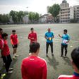 Beijing Institute of Technology's Spanish head coach Roberto Ahufinger del Pino instructs players during a training session in the Chinese capital