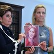 Attorney Gloria Allred (left) and a woman who gave her name only as Robin accuse Roman Polanski of having sexually assaulted Robin when she was a minor