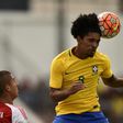 Brazilian player Douglas Luiz (right) vies for the ball with Paraguayan player Guillermo Paiva during their South American Championship U-20 match in the Bellavista stadium in Ambato, Ecuador on January 22, 2017