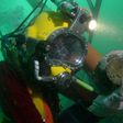 A diver works on the wreck of the Rooswijk, a Dutch East India Company ship which sank in 1740, on the sea bed off the coast of Ramsgate, southeast England, in a picture released by Historic England in London on August 18, 2017