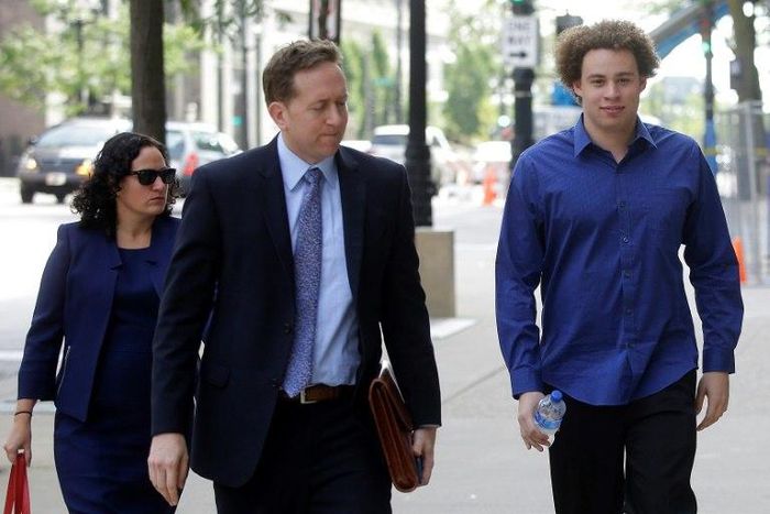 Marcus Hutchins (R), the British cyber security researcher accused of creating and selling malware that steals banking passwords, appeared at a court hearing Monday in Milwaukee, Wisconsin with his lawyers Marcia Hofmann and Brian Klein