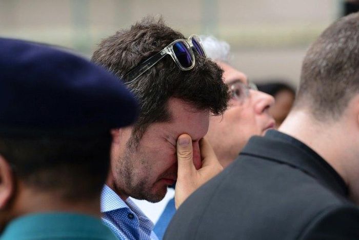 A relative of a victim reacts as he pays tribute to the victims of the Holey Artisan Bakery cafe deadly siege to commemorate the first anniversary of the attack carried out by Islamist militants, in Dhaka on July 1, 2017