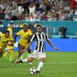 Juventus' Claudio Marchisio kicks the ball to score against PSG during their International Champions Cup (ICC) match, at the Hard Rock Stadium in Miami, Florida, on July 26, 2017