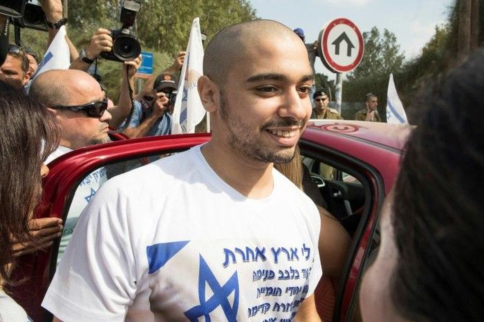 Israeli soldier Elor Azaria, who was convicted of manslaughter for shooting dead a prone Palestinian assailant, arrives at the Tserifin military base to begin his 18-month prison sentence on August 9, 2017