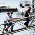 The body of one of the victims of a boat wreck, after a ferry sank off the northeastern state of Bahia, is brought ashore at the Maritime Terminal of Salvador on August 24, 2017