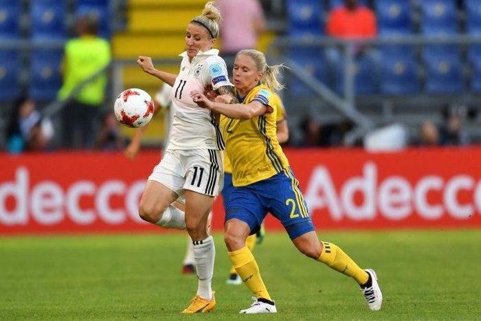 Anja Mittag (L) of Germany clashes with Jonna Andersson of Sweden during the UEFA Women’s Euro 2017