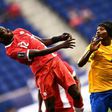 Canada's Alphonso Davies heads the ball next to French Guiana's Rhudy Evens during their 2017 CONCACAF Gold Cup Group A match, at the Red Bull Arena in Harrison, New Jersey, on July 7