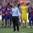Barcelona's new coach Ernesto Valverde speaks to spectators ahead of a friendly match at the Camp Nou stadium in Barcelona, on August 7, 2017