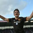 Hull City's defender Harry Maguire celebrates scoring Hull's first goal during the English Premier League football match against Stoke City April 15, 2017