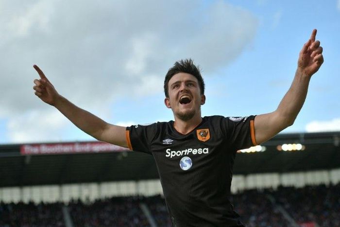 Hull City's defender Harry Maguire celebrates scoring Hull's first goal during the English Premier League football match against Stoke City April 15, 2017