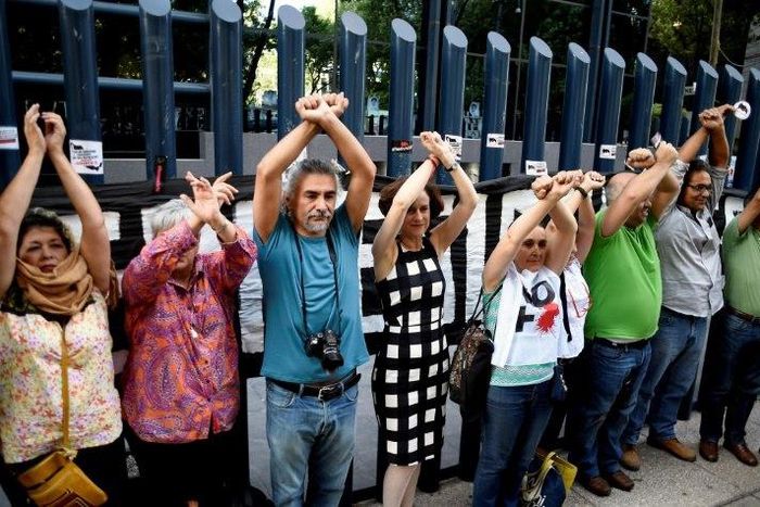 Leaders of Mexico's conservative party were targeted by the same spyware that the government is accused of using against journalists, an allegation that sparked protest from civil society activists and journalists, pictured on June 23, 2017