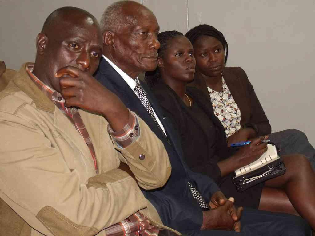 Jackson Kiprotich Kibor (2nd from left) following the proceedings of one of his divorce cases