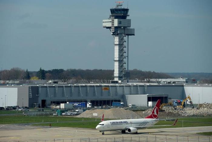 Airport traffic traffic was suspended and part of a terminal closed at Hanover airport after a man "broke through a barrier in a car which went on the runway"