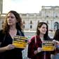 Activists hold signs reading "Stop criminalizing women, Free and safe abortion" and "Verbal, sexual or institutional, it is violence anyway" during a pro-abortion demo on November 11, 2014