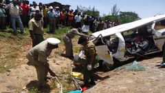 Police and the public at the scene of a recent accident