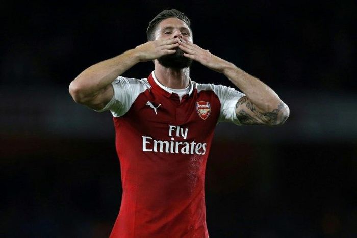 Arsenal's Olivier Giroud acknowledge supporters after their English Premier League match against Leicester City, at the Emirates Stadium in London, on August 11, 2017
