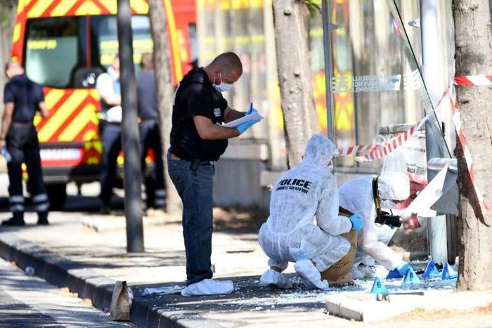 French police search through debris after a van ploughed through a bus stop in Marseille, on August 21, 2017