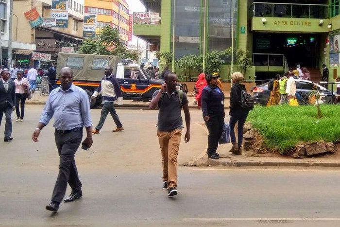 Police land rover at Afya Centre keeping away matatus from entering the CBD