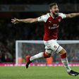 Arsenal's striker Olivier Giroud celebrates scoring Arsenal's fourth goal during the English Premier League football match against Leicester City at the Emirates Stadium in London on August 11, 2017