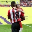 Jermain Defoe carried Bradley Lowery onto the pitch as Sunderland and Swansea fans held a moving tribute for the cancer-stricken toddler at the Stadium of Light on May 13, 2017