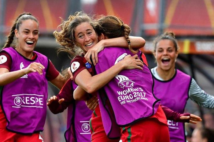 Portugal's forward Carolina Mendes (2nd L) celebrates with teammates after scoring a goal on July 23, 2017