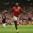 Manchester United's striker Romelu Lukaku celebrates scoring his team's second goal during the English Premier League football match against West Ham United August 13, 2017