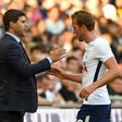 Tottenham Hotspur's striker Harry Kane (R) talks to team manager Mauricio Pochettino during a pre-season friendly match against Juventus, at Wembley stadium in London, on August 5, 2017