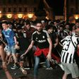 (FILES) This file photo taken on June 04, 2017 shows Juventus' supporters evacuating the Piazza San Carlo after a panic movement in the fanzone where thousands of Juventus fans watched the UEFA Champions League Final football match between Juventus and...