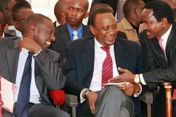 Nasa leader Kalonzo Musyoka (right), President Uhuru Kenyatta and Deputy President William Ruto at a past function in Kericho.