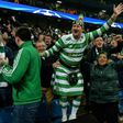 Celtic fans celebrate following a UEFA Champions League match in Manchester, in 2016