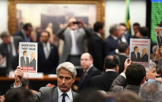 Representatives of the opposition protest in the lower house's Committee on Constitution and Justice against the veto to the report authorizing the opening of proceedings in the Supreme Court against President Temer, in Brasilia, on July 13, 2017