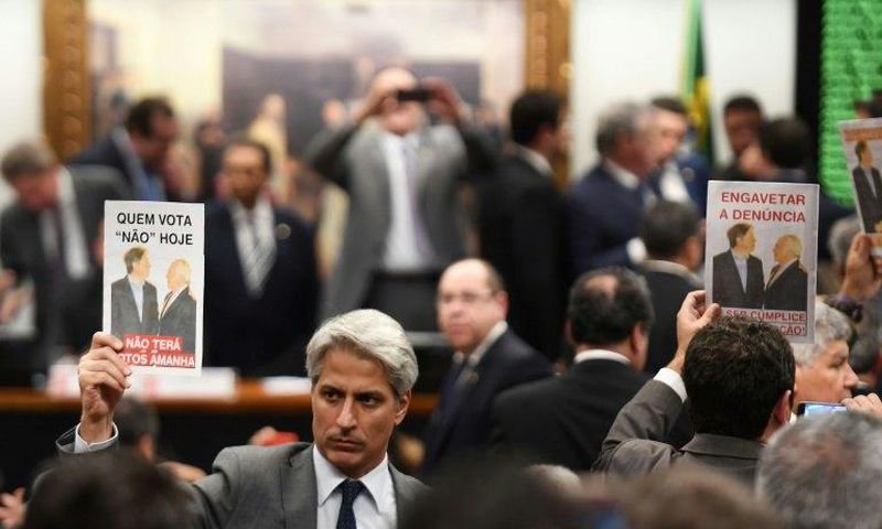 Representatives of the opposition protest in the lower house's Committee on Constitution and Justice against the veto to the report authorizing the opening of proceedings in the Supreme Court against President Temer, in Brasilia, on July 13, 2017