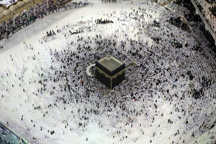 Muslim worshippers pray at the Kaaba, Islam's holiest shrine, at the Grand Mosque in Saudi Arabia's holy city of Mecca on June 23, 2017, during the last Friday of the holy month of Ramadan
