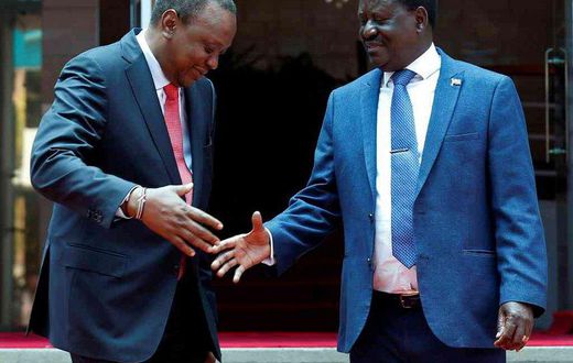 Raila Odinga with President Uhuru Kenyatta. Jubilee MP's are asking quit from politics and concentrate more on his new role as the High Representative for Infrastructure Development in Africa.
