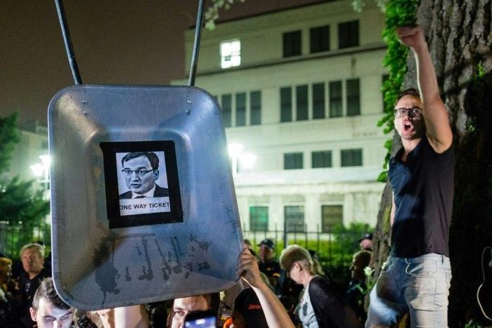 During the 15-hour debate thousands of demonstrators took to the streets nationwide to protest the law