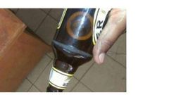 The condom in the beer bottle.