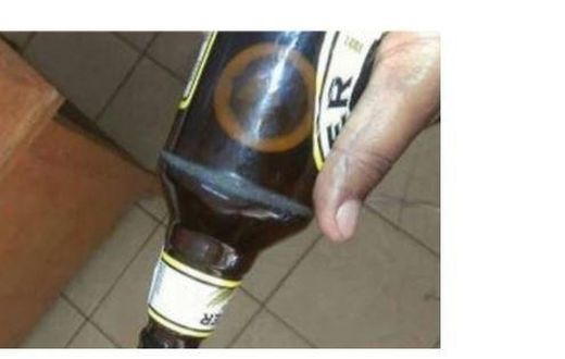 The condom in the beer bottle.