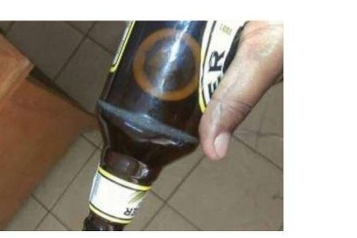 The condom in the beer bottle.